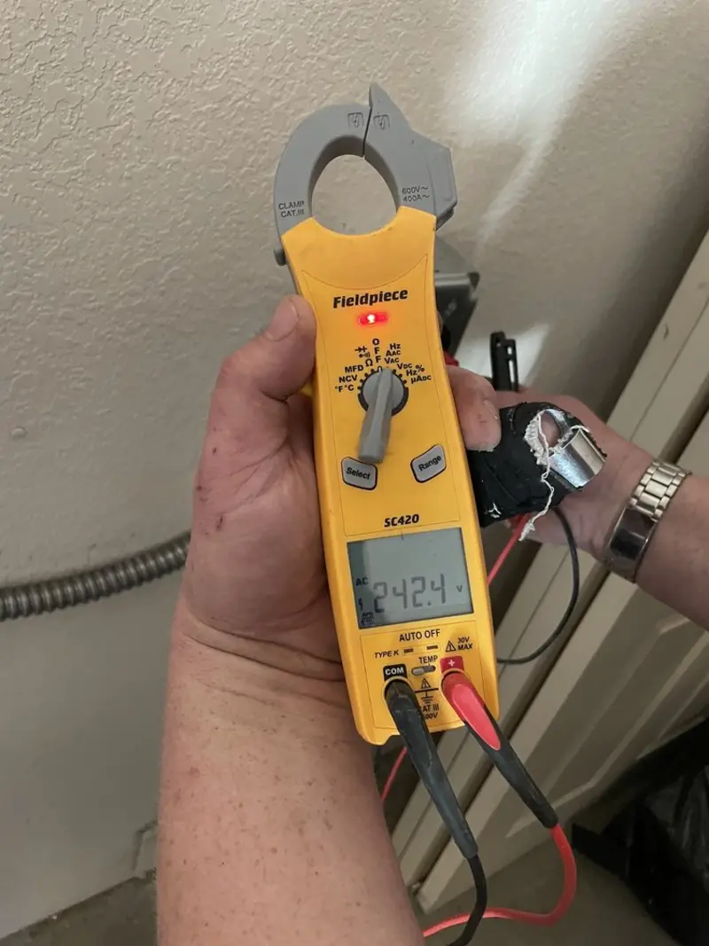 Voltage testing with clamp meter during Outlet Installation in Orangevale